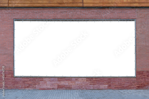 Empty wide tarpaulin billboard mockup on brick wall