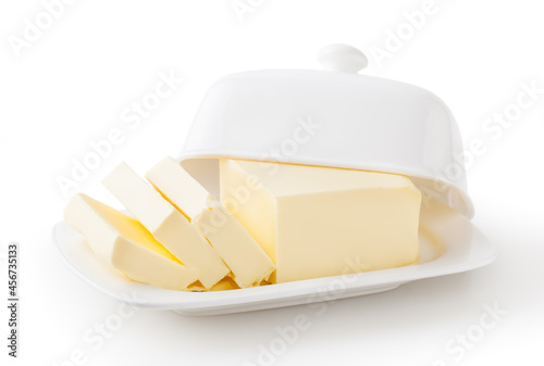 Butter on white butter dish isolated on white background with clipping path
