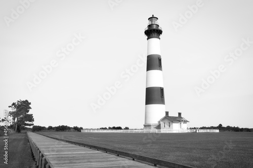 A landscape of the Bodie Island lighthouse in North Carolina. A black and white cutout for copy space.