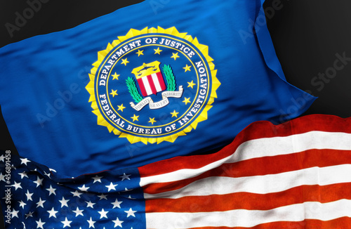 Flag of the Federal Bureau of Investigation along with a flag of the United States of America as a symbol of unity between them, 3d illustration