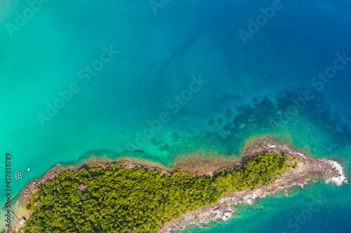 Exotic sea beach island turquoise water with tropical green tree forest