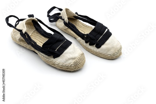 Some handmade espadrilles, typical rural Aragonese footwear, used for the field and dance called jota, white background