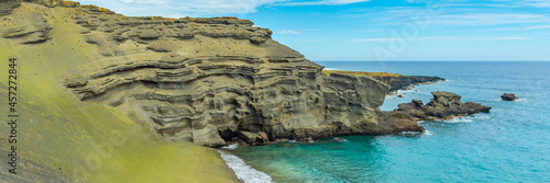 Beautiful panorama view of Papakolea green sand beach on big island of Hawaii, USA. vertical
