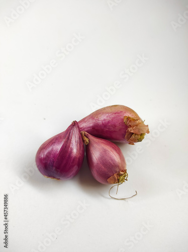 Photo of raw shallot isolated on a white background