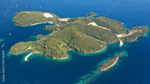 Aerial drone panoramic photo of iconic vegetated paradise island of Skorpios formerly owned by Aristotle Onassis, Lefkada island, Ionian, Greece