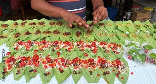 banarasi pan, betel nut for sale.Paan, meaning leaf, is a preparation combining betel leaf with areca nut widely consumed in India. It is chewed for its stimulant and psychoactive effect.