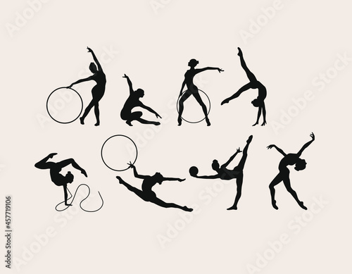 A set of seven vector black silhouettes of gymnasts athletes