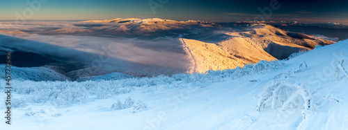 A view from the top of Wielka Rawka to the Bieszczady peaks at sunset, the Bieszczady Mountains