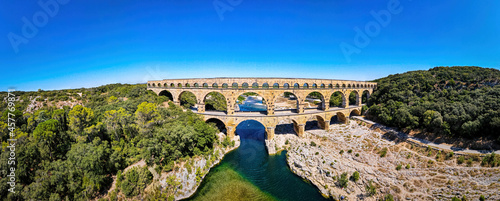 The aerial view of the Pont du Gard, an ancient tri-level Roman aqueduct bridge in France