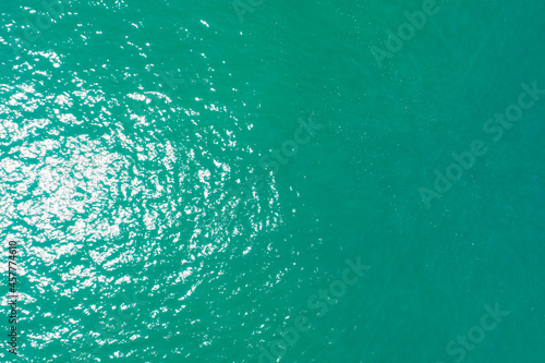 Top down aerial view of turquoise ocean Sea surface and wave texture Amazing nature background