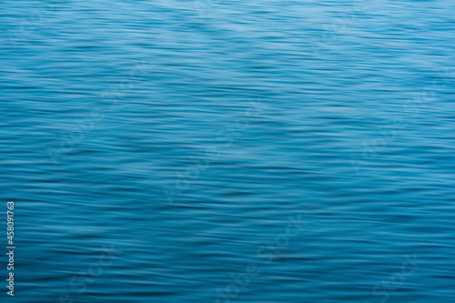 blurred blue water background with waves