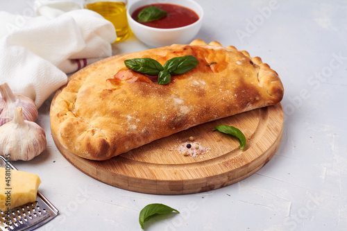 traditional closed italian pizza calzone