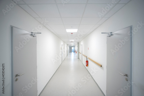empty clean and white corridor in modern medical interior