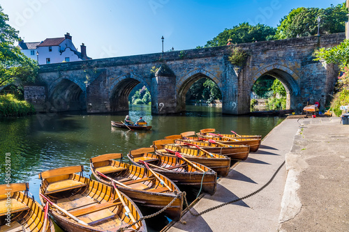 A view along the River Wear towards the Elvet Bridge in Durham, UK in summertime