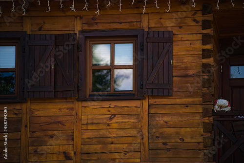 Okno , okiennica , drewniany dom . Window, shutter, wooden house.