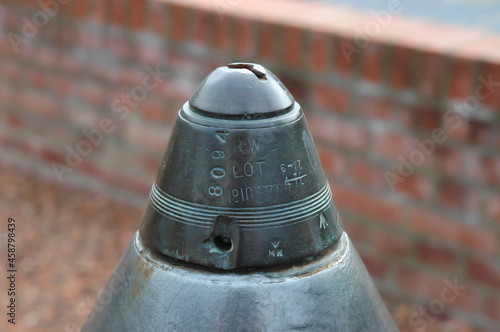 detail of a british first worldwar artillery shell percussion fuze. detonator with engraved lot and type number