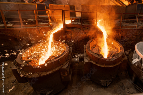 Blast furnace slag tapping. The molten slag is poured into a ladle.