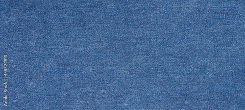 texture of blue jeans denim fabric background 