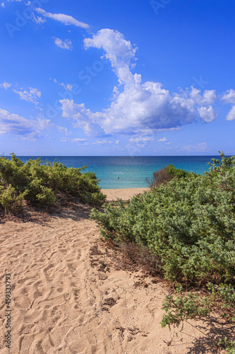 Torre Colimena Beach in Apulia, Italy. Inside the Nature Park “Palude del Conte e Dune Costiere”, the bay of Torre Colimena, with its salt pan, stretches in the area of Manduria. 