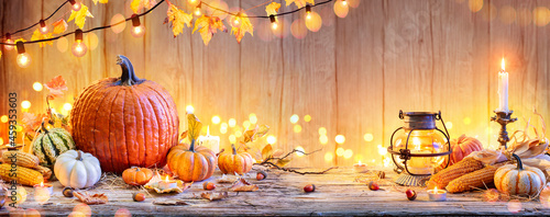 Pumpkins On Wooden Table - Thanksgiving Background With Vegetables And Bokeh Lights