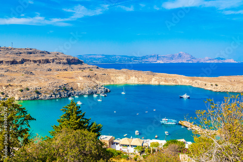 Lindos Beach bay panorama with turquoise clear water Rhodes Greece.