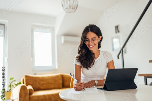 Adult woman, working hard from home.