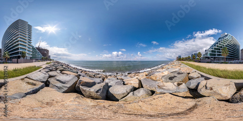 360 seamless hdri panorama view on seashore or ocean with skyscrapers with blue sky and good weather in equirectangular spherical projection, ready AR VR virtual reality content