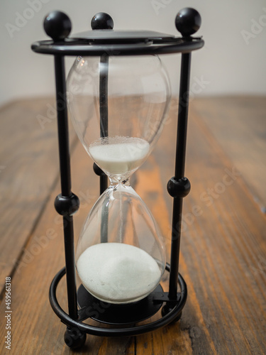 Hourglass on a Wooden background
