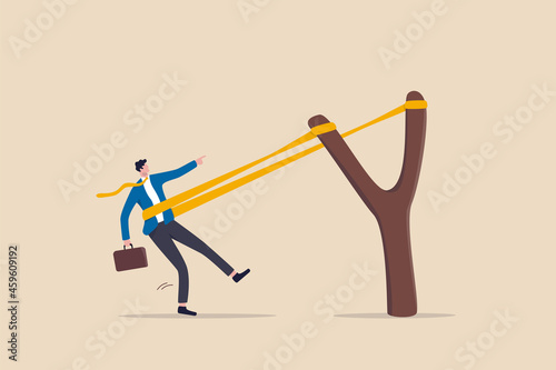 Entrepreneurship ready to launch new project or work improvement, boost career development, speed up business growth concept, brave businessman pull rubber band ready to launch slingshot flight.