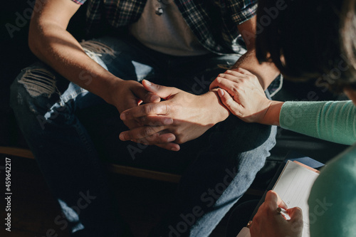 People support each other in a rehab session