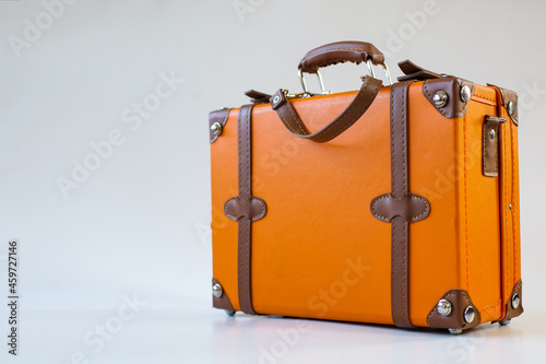 Vintage leather suitcase isolated on white background