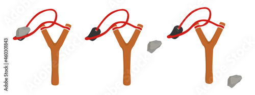 Wooden slingshot with flying stone