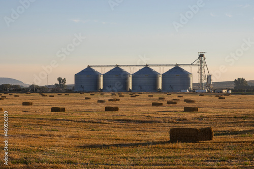 Idaho farm and ranch land with hale bales and silos
