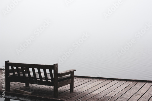 Depression and silence. Lonely bridge. Silence lake. Fog