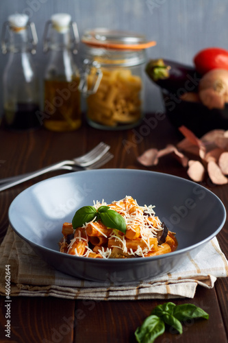 pasta alla norma with eggplant ricotta tomato sauce copy space