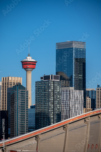 Calgary's modern skyline with blue sky. 