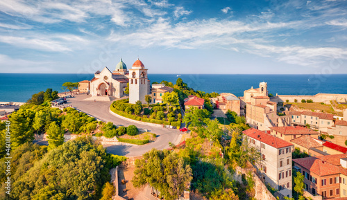 View from flying drone of Cattedrale di San Ciriaco church and San Gregorio Illuminatore - Catholic church. Spectacular summer cityscape of Ancona town, Italy, Europe. Traveling concept background.