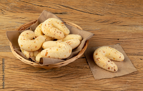 Chipas, typical south american cheese bun over wooden table