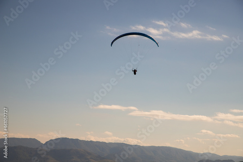glider paragliding g against blue sky flying adrenaline and freedom concept