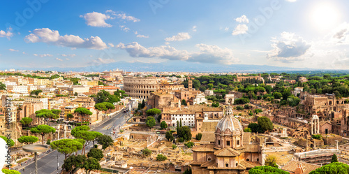 Sunny panorama of Rome, Forum, Capitoline Hill, Coliseum, Italy