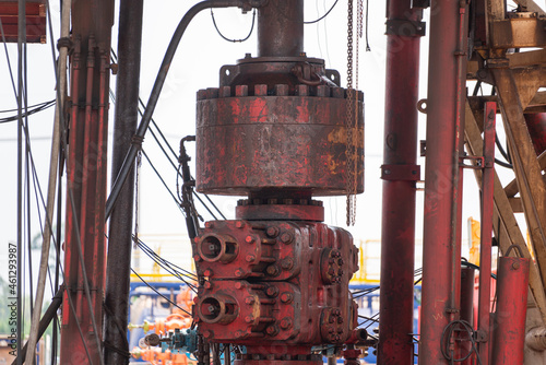 BOP (Blow out preventer) for oil drilling operation which is installed on wellhead, this equipment is using for secure hydrocarbon blowout from downhole. Heavy industrial equipment object photo.