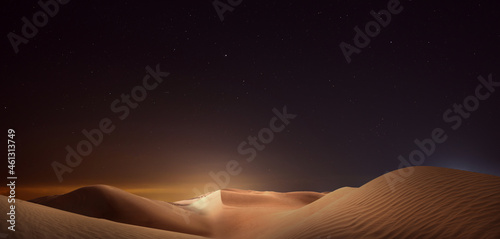 Scenic view of sandy desert under starry sky in night. Banner design