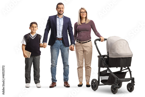 Full length portrait of a family of a father, mother with a baby stroller and a schoolboy