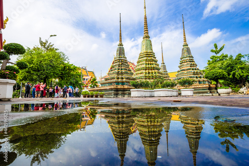 Beautiful pagoda of Wat Pho temple complex against blue sky sightseeing travel in Bangkok