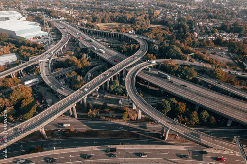 Vehicles in the UK Driving on a Spaghetti Junction Interchange in the Autumn