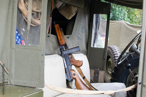 Sheringham, Norfolk, UK - SEPTEMBER 14 2019: M1 Thompson semi-automatic gun on the seat of a WWII jeep