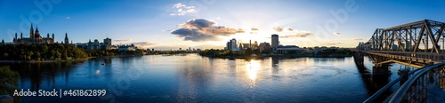 Panoramic view of the Ottawa River with Ottawa's Parliament Hill on one side and the City of Gatineau on the other