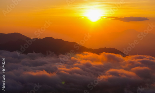 Golden sunrise with sea of fogs. Beautiful view for natural background or wallpaper. 