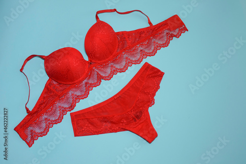 Sexy lingerie. Flat lay lace bra and panties in bright scarlet color
