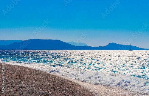 Elli beach landscape Rhodes Greece turquoise water and Ialysos view.